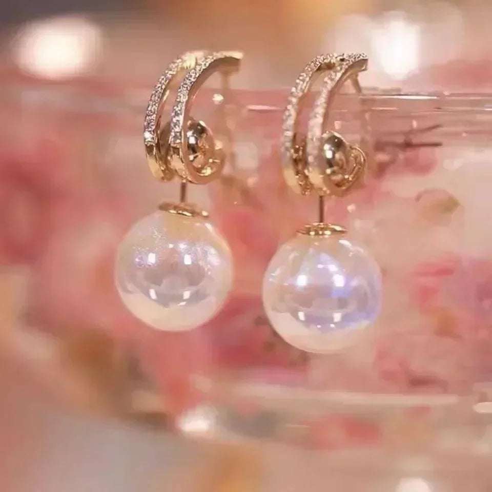 Mays earing