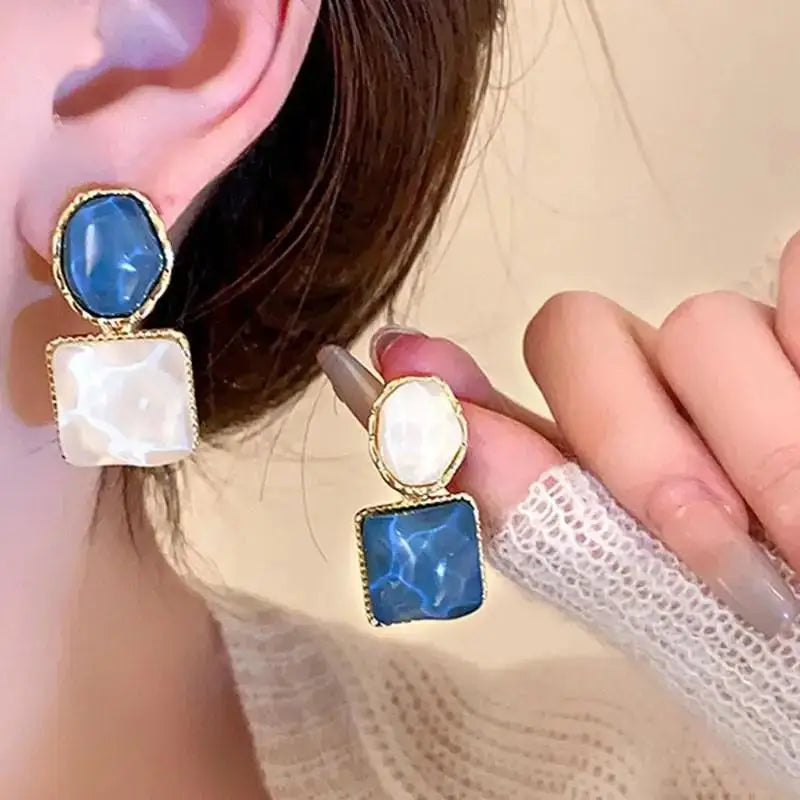 Mays earing