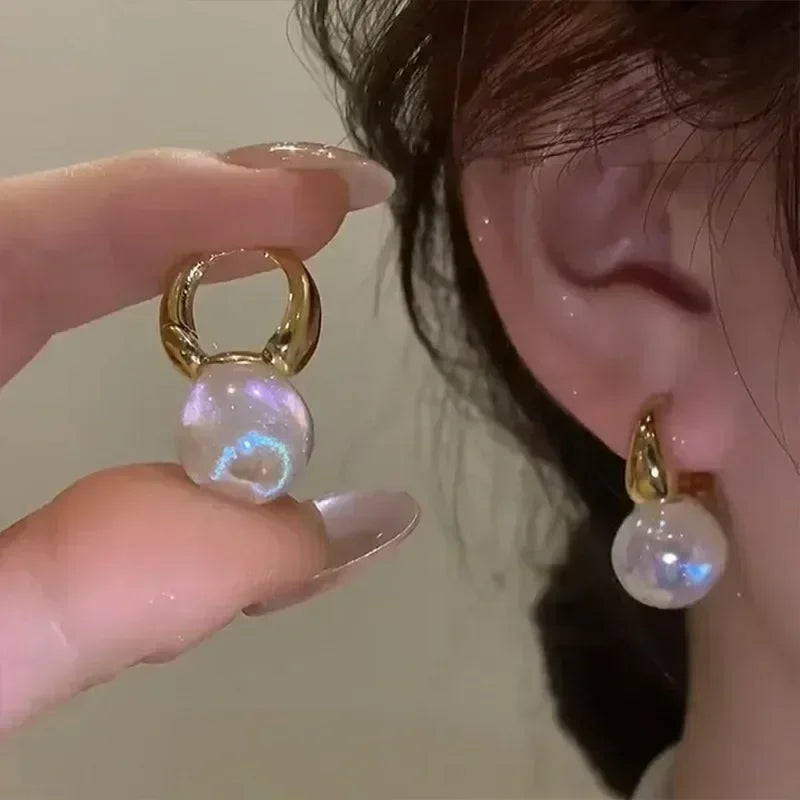 Mays earing
