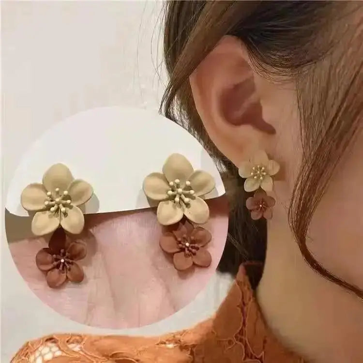 Mays earing