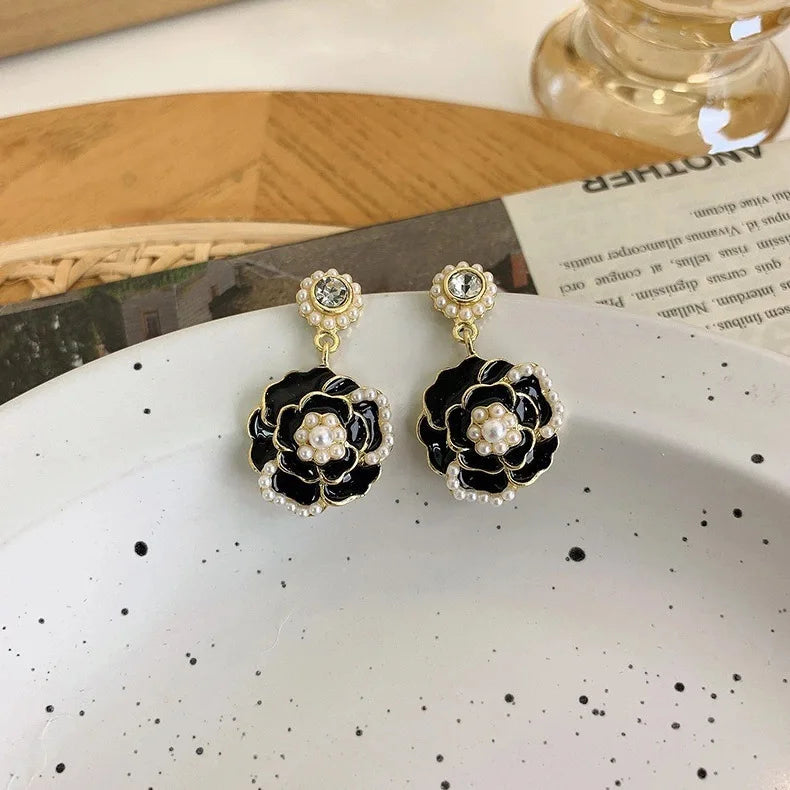 Mays earing