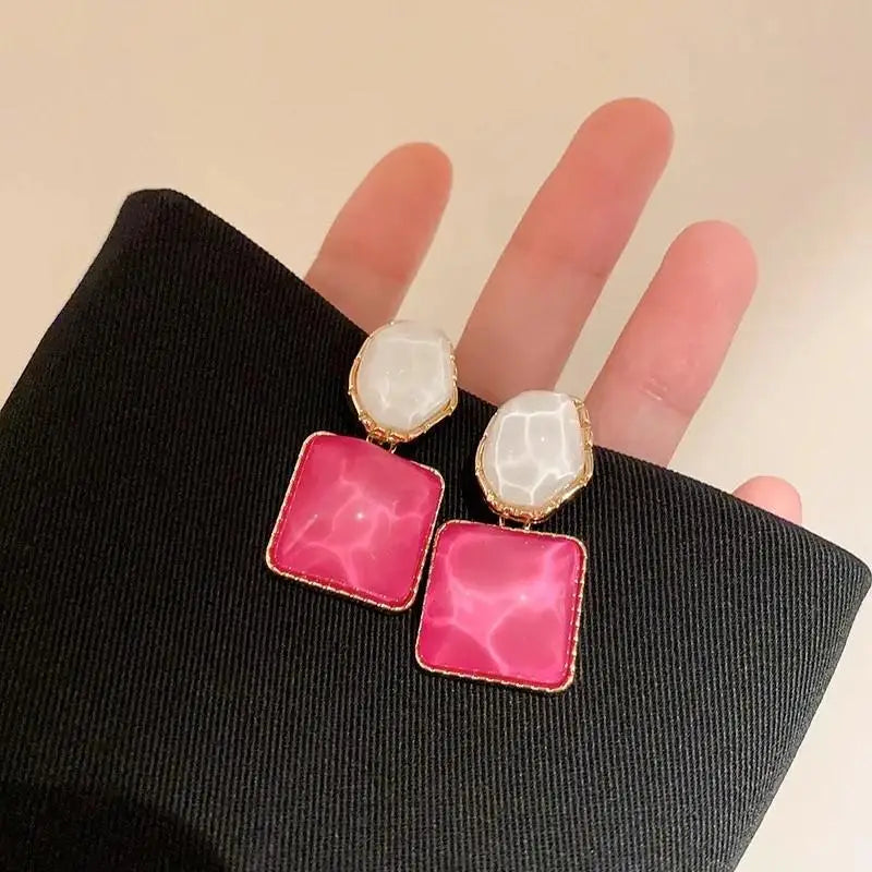 Mays earing