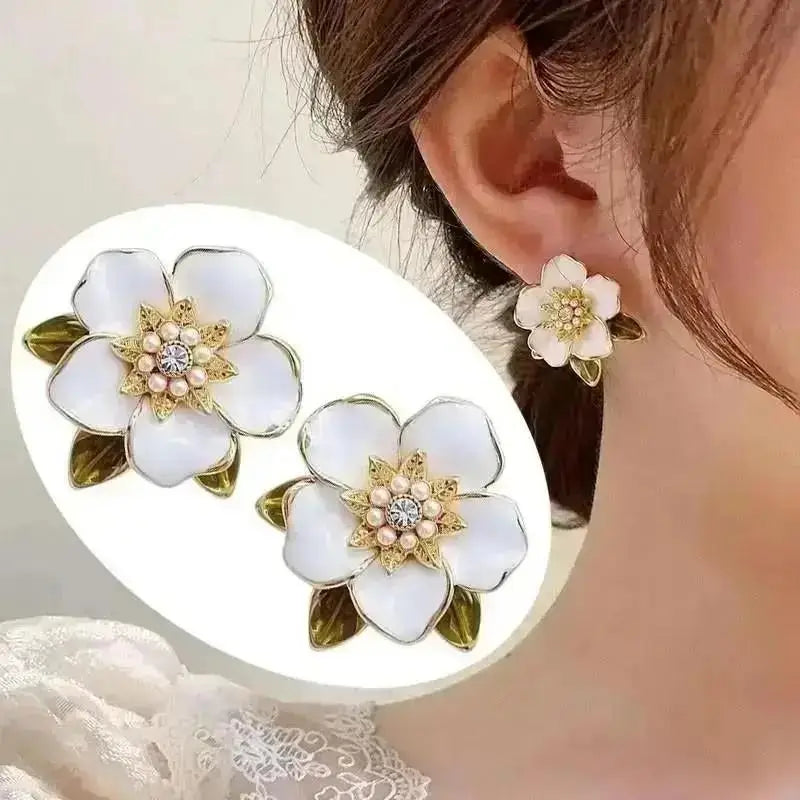 Mays earing