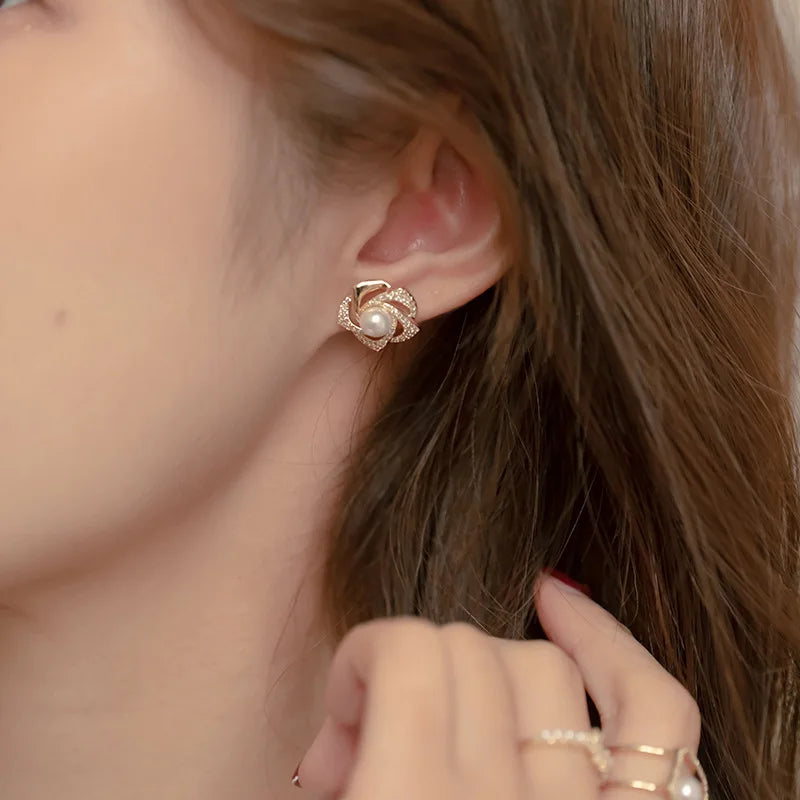 Mays earing
